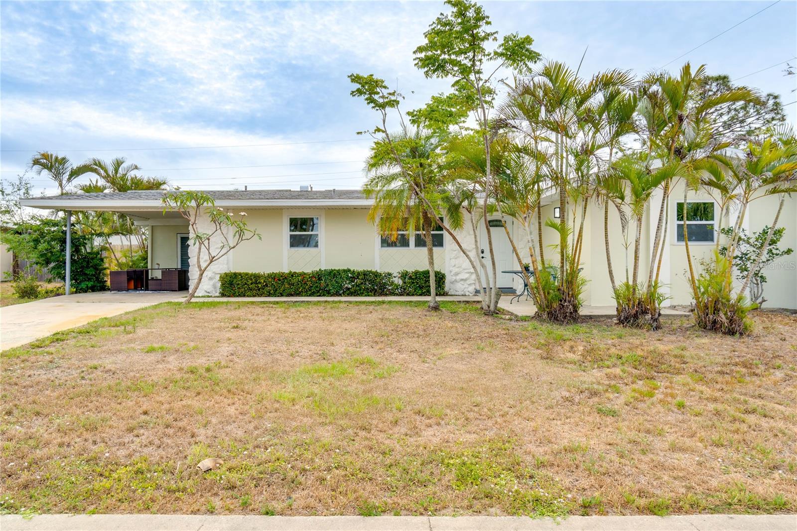 Step into this stunning renovated 3-bedroom, 2-bathroom, Pool Home in the heart of North Port (No Flood Insurance Required). This property has been meticulously upgraded to offer a modern living experience. Enjoy peace of mind with a Newer roof, New A/C system, Hurricane-impact windows, and an energy-efficient tankless water heater. The interior boasts luxury flooring throughout the entire home, enhancing its elegant appeal. The kitchen features new appliances and stylish cabinetry, perfect for culinary adventures. The primary bedroom features its own ensuite bathroom equipped with a walk-in shower and pool access. Step outside to a refreshing fenced-in yard with a swimming pool, providing an ideal setting for relaxation and entertainment. Nestled in one of North Port's most sought-after neighborhoods and within proximity to some of Florida's finest beaches, you're never far from a day spent with your toes in the sand or exploring the charming local community. Don't miss the opportunity to own this beautifully renovated home in a prime location. Schedule your showing today and experience the elegance and comfort this home has to offer.