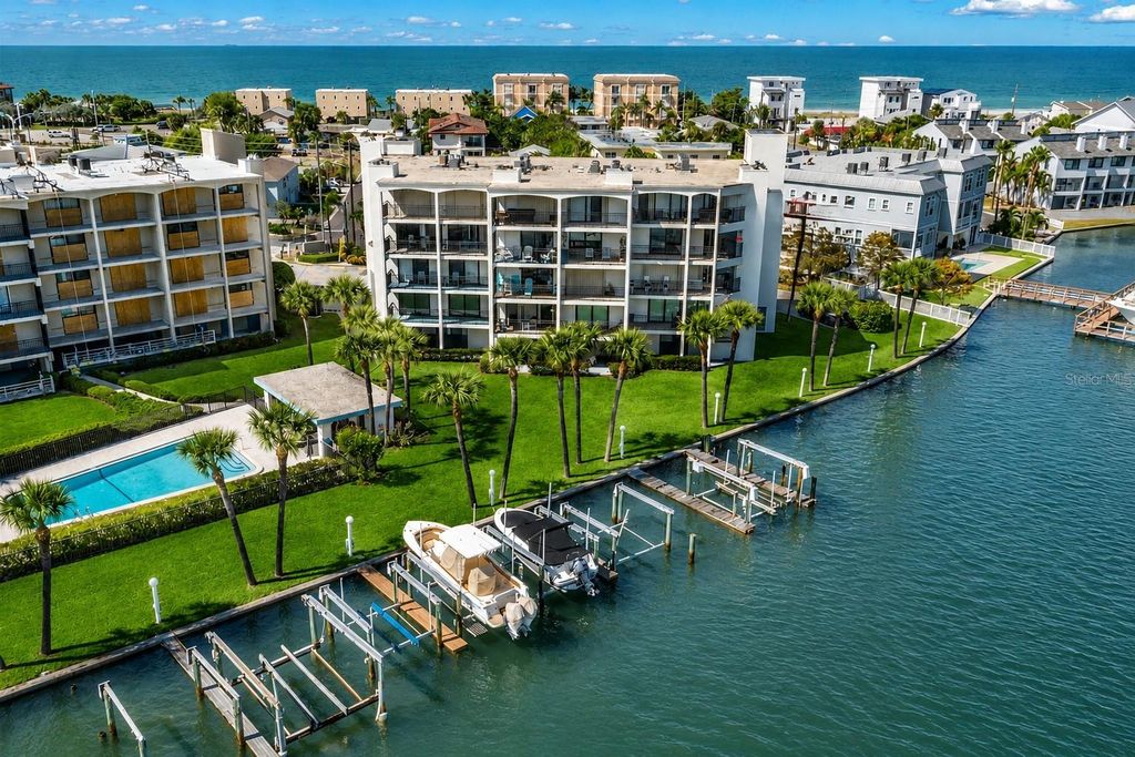 Photo of 9825 Harrell Avenue #404, Treasure Island, FL 33706 (MLS # TB8505649)