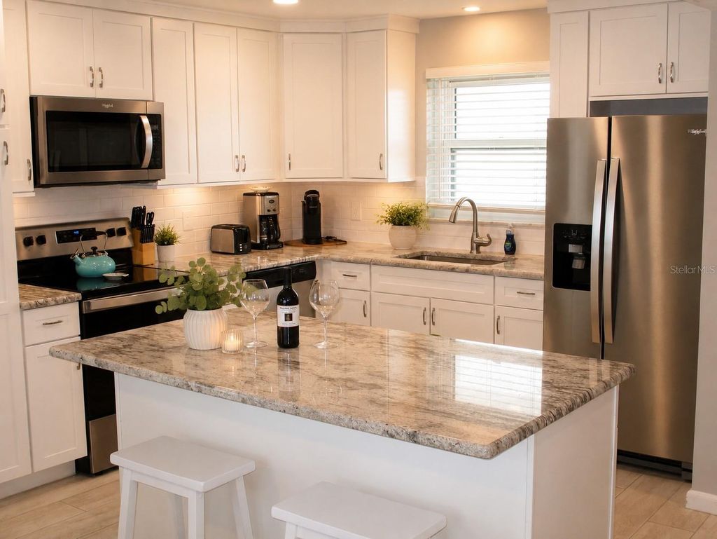 Photo of 9825 Harrell Avenue #404, Treasure Island, FL 33706 (MLS # TB8505649)