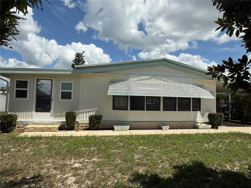 "Escape to paradise in this charming 2-bedroom, 2-bathroom haven in a 55+ community in Tavares, Florida! With land ownership and a low HOA fee of just $50/month, you'll enjoy the freedom to live life on your terms. The Florida room is a versatile space perfect for a home office or family room. The kitchen is designed for ease and convenience, while the dining area is ideal for hosting friends and family. Take in the neighborhood views from the spacious living room. Plus, with Lake Frances and Tavares being golf cart-friendly, you can zip around town on your golf cart, grab groceries, dine at local eateries, or take in the breathtaking sunsets on Lake Dora. Ready to make this house your home? Schedule a showing today and make your retirement dreams a reality!"