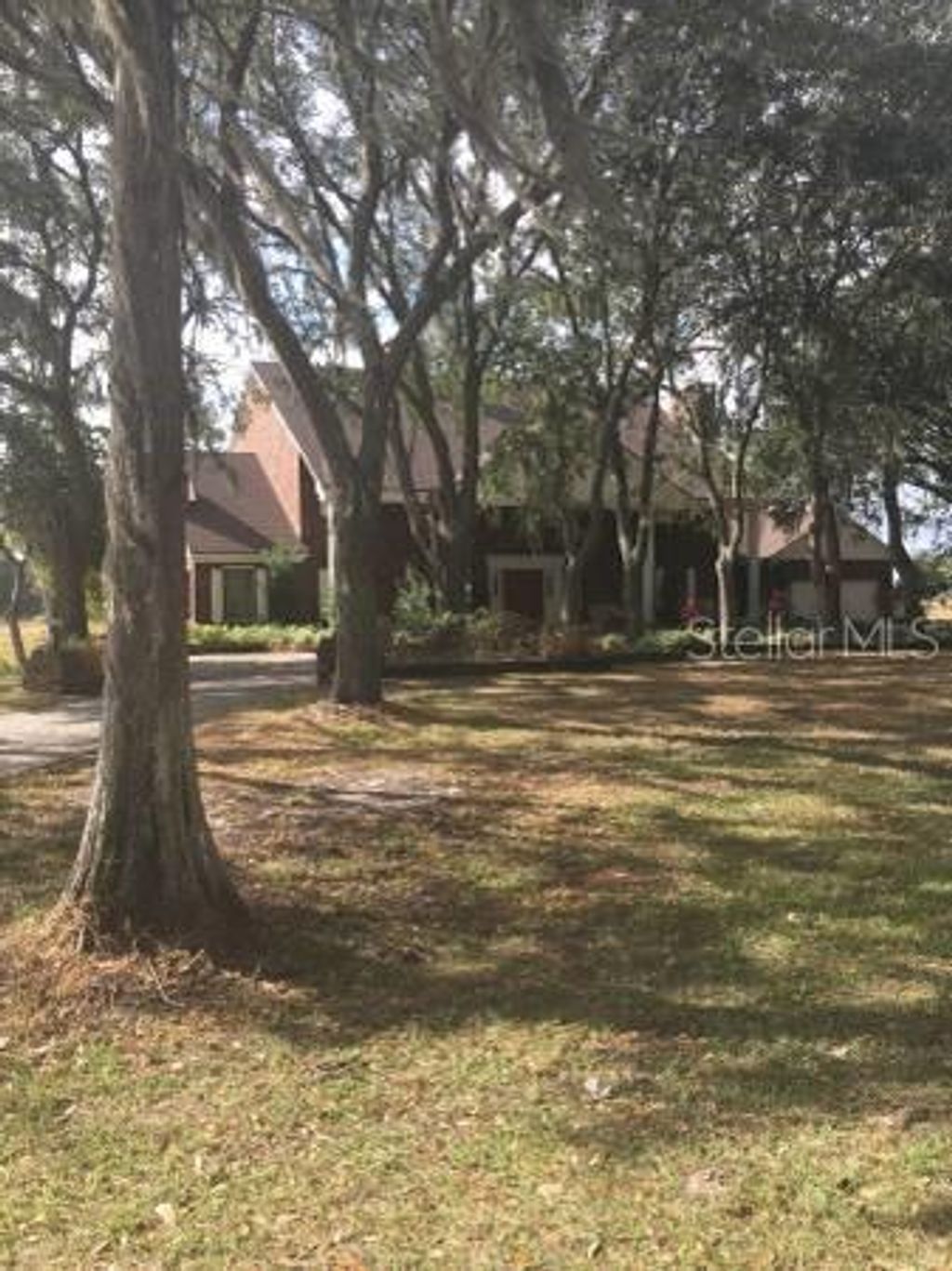 Photo of 12537 Tomar Drive, Thonotosassa, FL 33592 (MLS # TB8445951)