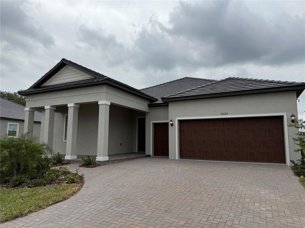 Photo of 31624 Cardinal Yard Drive, San Antonio, FL 33576 (MLS # TB8361890)