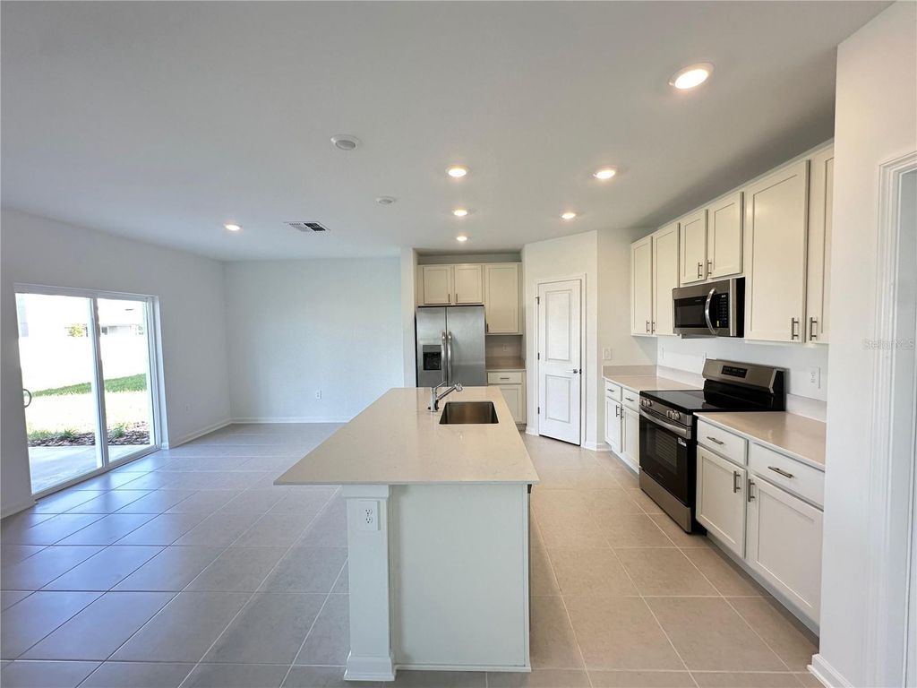 Photo of 5675 Portico Pl, Kissimmee, FL 34758 (MLS # O6383488)