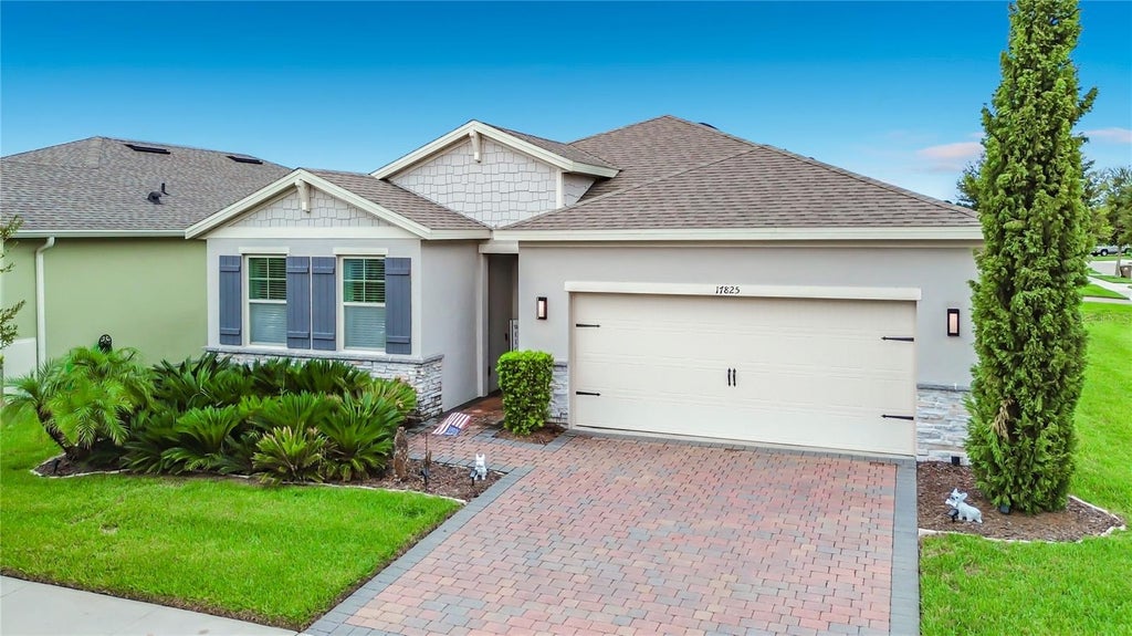 Photo of 17825 Blazing Star Circle, Clermont, FL 34714 (MLS # TB8545204)