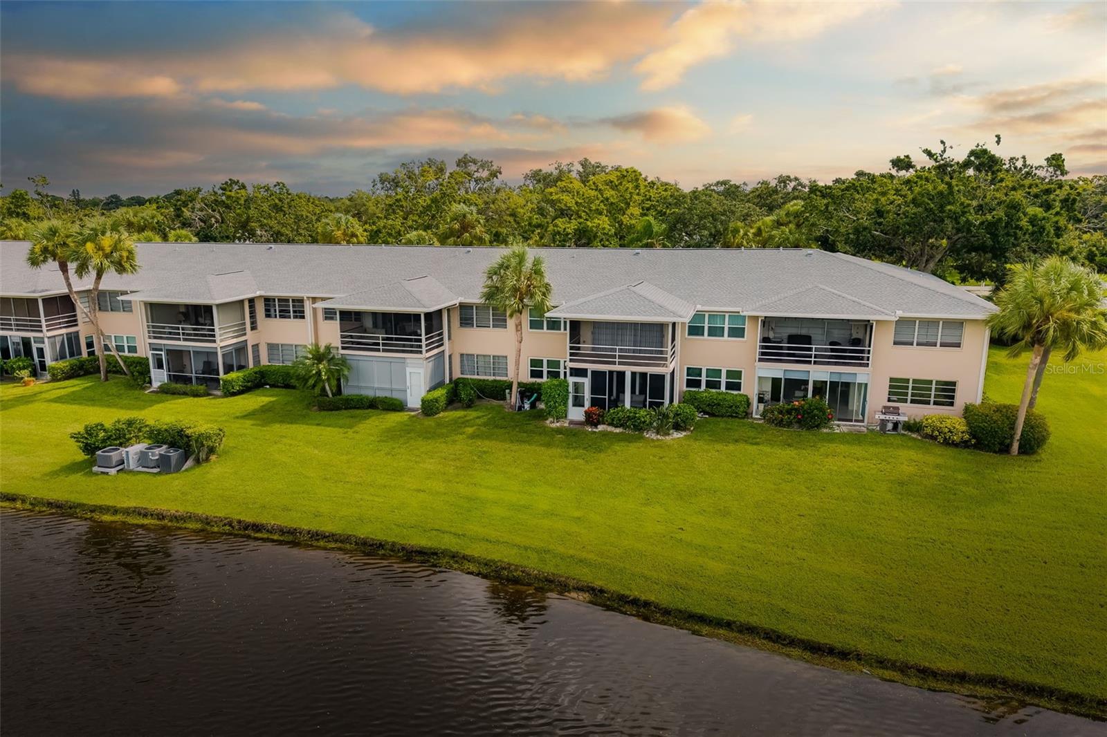 Welcome to your slice of paradise in the prestigious Palm-Aire community, where golf course living meets modern luxury in this stunning condominium. This fully renovated gem sparkles from floor to ceiling, featuring brand new matching floors throughout and fresh ceilings throughout. The owner spared no expense with over $65,000 in recent improvements!
The heart of this home showcases a completely reimagined kitchen with sleek new cabinets, granite countertops, stainless steel appliances, and sophisticated crown molding accented by recessed lighting. The primary bedroom retreat boasts an elegantly renovated bathroom complete with new vanities, granite surfaces, contemporary shower tile, convenient heat lamps, and a pristine glass door.
Step onto your screened lanai and prepare to be enchanted by serene water views overlooking the meticulously maintained golf course, where morning coffee becomes a daily celebration and beautiful sunsets paint the sky in brilliant hues from your private lanai. The new air conditioning and heating system ensures year-round comfort in your personal oasis. Parking is a breeze with a dedicated spot just for you.
Monthly fees cover an impressive array of amenities including community pool access, exterior building insurance and maintenance, grounds upkeep, water, sewer, trash, and pest control. Optional country club membership opens doors to two championship golf courses, tennis, pickleball, padel courts, fitness facilities, aquatic center, and dining venues.
Location enthusiasts will appreciate the proximity to University Town Center's shopping and dining, downtown Sarasota's cultural attractions, and the sugar-sand beaches of Siesta Key and Lido Beach. This exceptional residence perfectly balances tranquil resort-style living with convenient access to Sarasota's most coveted destinations. Opportunities like this are rare! Secure your private viewing today and see why this condo is the perfect fit for you.