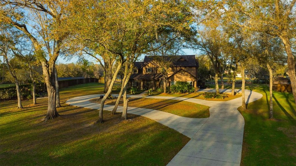 Photo of 1710 Newberger Road, Lutz, FL 33549 (MLS # TB8483486)