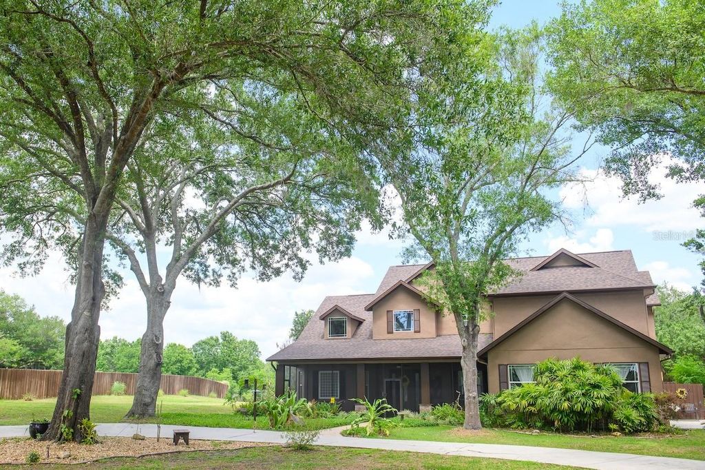 Photo of 1710 Newberger Road, Lutz, FL 33549 (MLS # TB8483486)