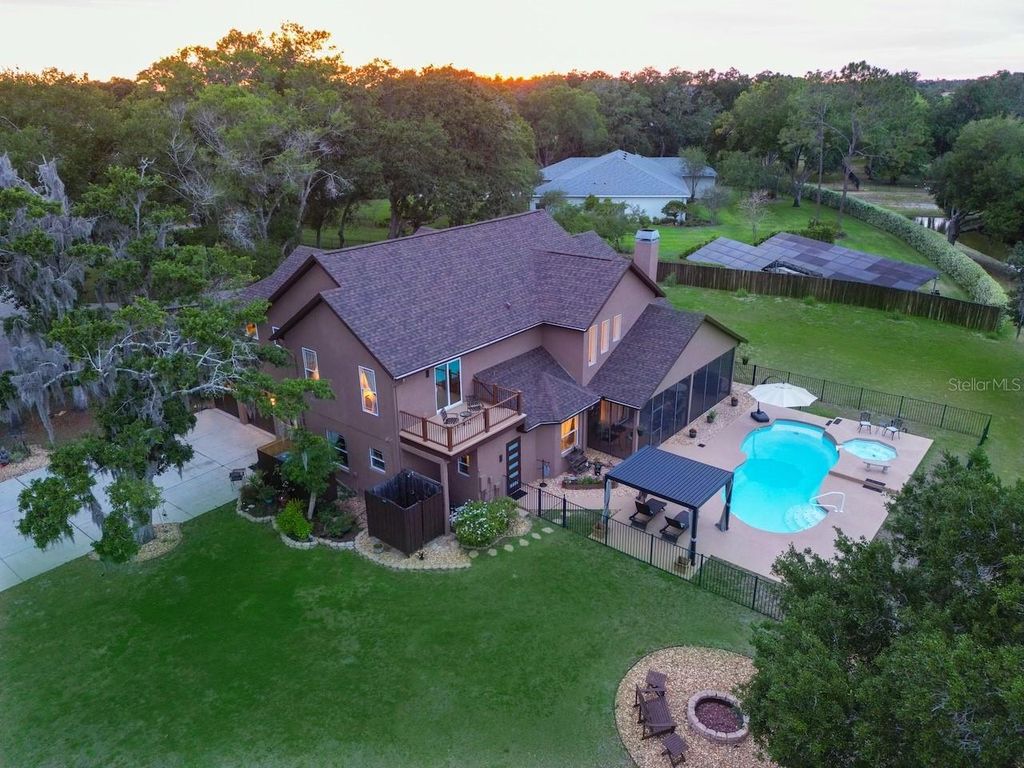 Photo of 1710 Newberger Road, Lutz, FL 33549 (MLS # TB8483486)