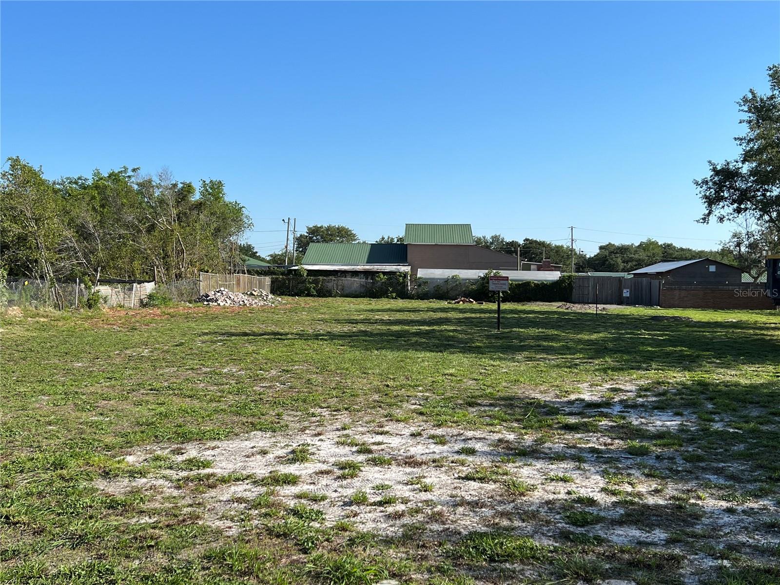 *Price Improvement. Numerous business opportunities are possible with this large, cleared lot which includes storm drain, underground utilities, 10 paved and lighted parking spaces. This lot is located within the City of Apopka, zoned C-C for Community Commercial District. The following are a sampling of permitted uses: adult day care, cultural facility, veterinary clinic, restaurant, dance studio, place of worship, laundry, personal vehicle sales and microbrewery to name a few, see attached list for more. *Seller is agreeable to owner financing with 25% down.