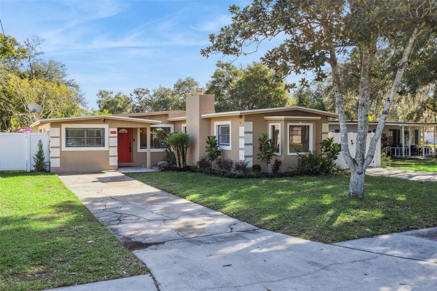 Discover this beautifully updated open concept home in the heart of Belle Isle, Florida an ideal location for watercraft enthusiasts who enjoy quick access to the Conway Chain of Lakes. This spacious three bedroom, three bathroom residence features a large, inviting living room accented by a modern oversized ceiling fan and flows effortlessly into the rest of the home. A generous flex room with a built-in desk offers the perfect space for a home office, study, or creative workspace.

The interior has been thoughtfully renovated throughout. New tile has been installed in the laundry room and two of the bedrooms, and all three bathrooms have been completely remodeled with new tile, new cabinets, modern toilets, and fresh baseboards. The home also features fresh interior and exterior paint, new ceiling fans, and new custom blinds, enhancing both comfort and style. The kitchen has been upgraded with a beautiful backsplash, quartz countertops, and a charming kitchen nook that adds warmth and character to the space.

Each bedroom offers unique functionality. The first bedroom includes a ceiling fan, built-in desk, and custom cabinetry. The second bedroom includes its own built-in desk and spacious closet. The primary suite serves as a private retreat with a sitting nook, wood-burning fireplace, and a renovated en-suite bathroom featuring a walk-in shower with no tub.

The home is move-in ready, and all major appliances convey, including the refrigerator, washer and dryer, dishwasher, and microwave.

Outside, the backyard is designed for low-maintenance living with pavers and durable astroturf grass. The fully fenced yard is divided into sections, offering versatility for pets, outdoor entertaining, or a private lounge area. Two outdoor storage units stay with the home, providing convenient additional space.

Perfectly positioned in desirable Belle Isle, this home blends modern upgrades with ideal proximity to lake access making it an exceptional choice for everyday living and for those who love life on the water.