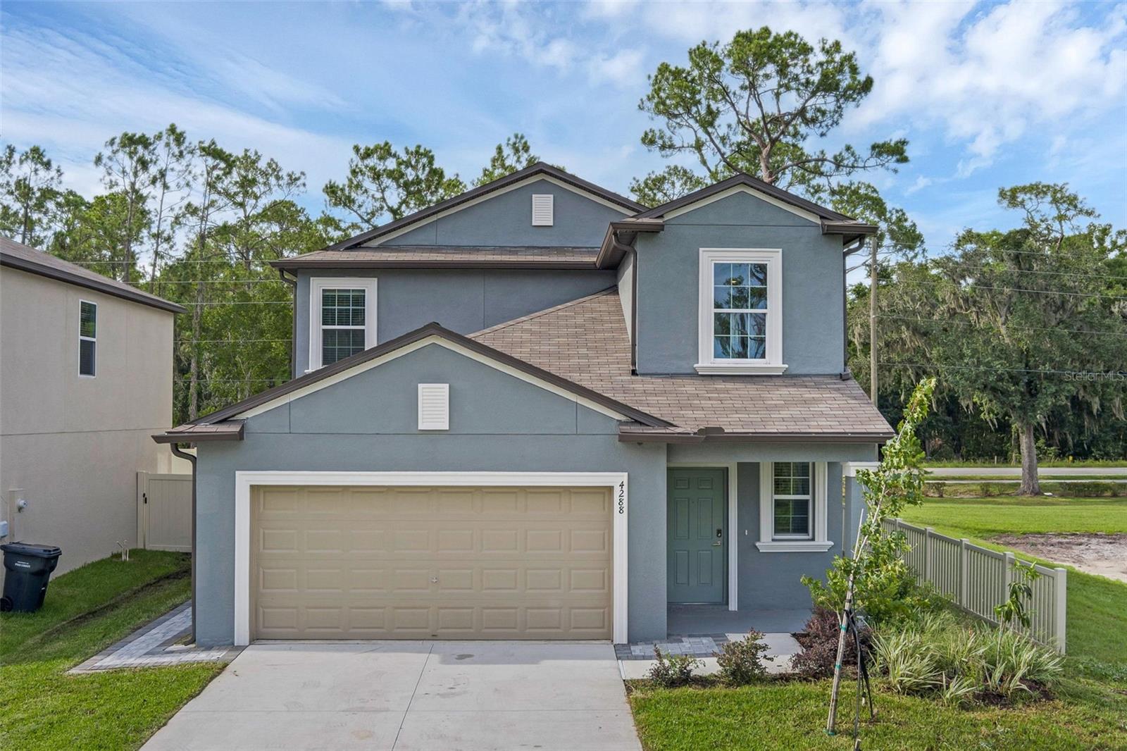 Spacious New 5 Bed 2 1/2 bath home in Saddle Creek Preserve. This beautiful home features a bright and open concept living space with the primary bedroom conveniently located on the main level with an en-suite bathroom and walkin closet. This floor plan is ideal for family time and entertaining. The second floor features a flexible loft area and the other 4 bedrooms. Located just off I-4 in Lakeland, this home offers easy access to downtown's charming boutiques and restaurants, plus scenic lakefront parks. Saddle Creek Preserve offers a beautiful community pool for your enjoyment. Ready for immediate move-in.