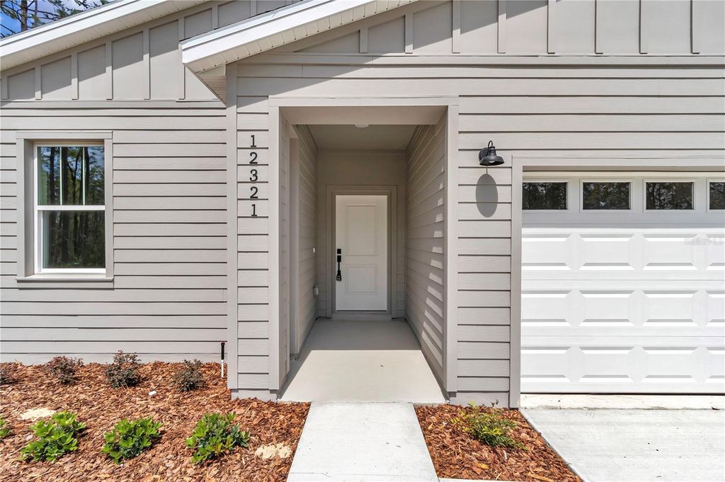 Photo of 12321 SW 76th Lane, Dunnellon, FL 34432 (MLS # O6274940)