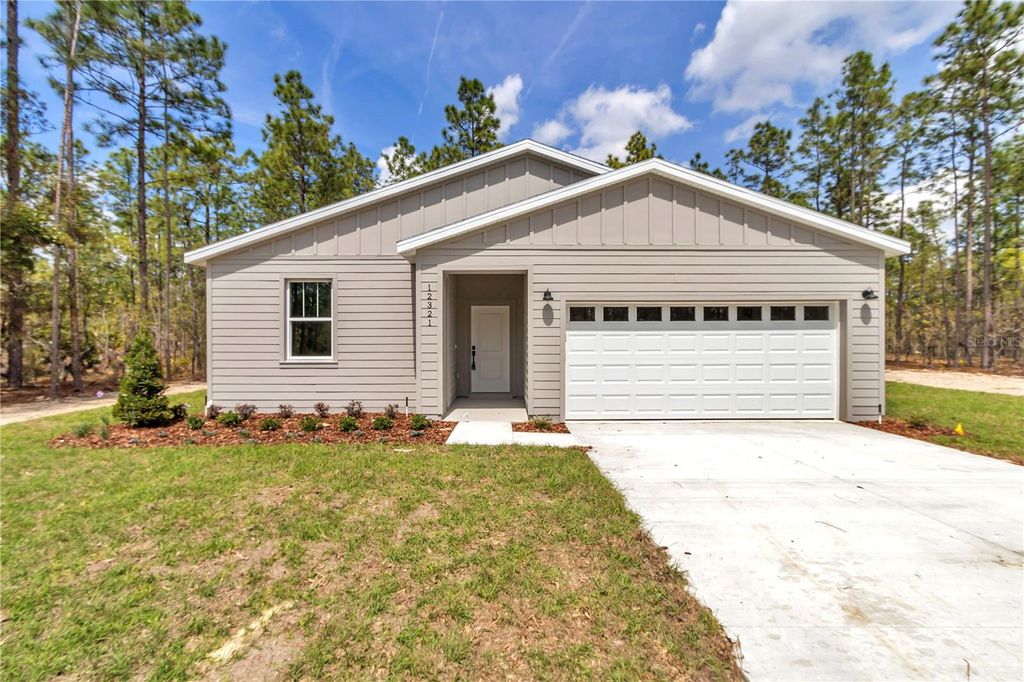 Photo of 12321 SW 76th Lane, Dunnellon, FL 34432 (MLS # O6274940)