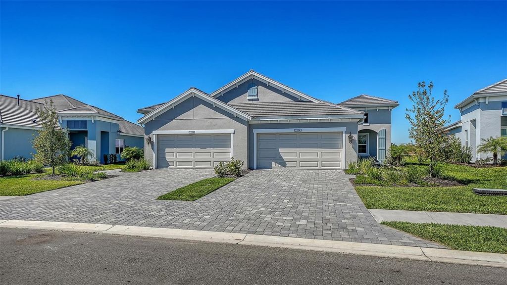 Photo of 2114 Sylvester Palm Lane, Bradenton, FL 34212 (MLS # TB8481543)