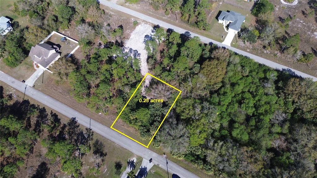 Photo of 755 Chambers Street E, Lehigh Acres, FL 33974 (MLS # O6307911)