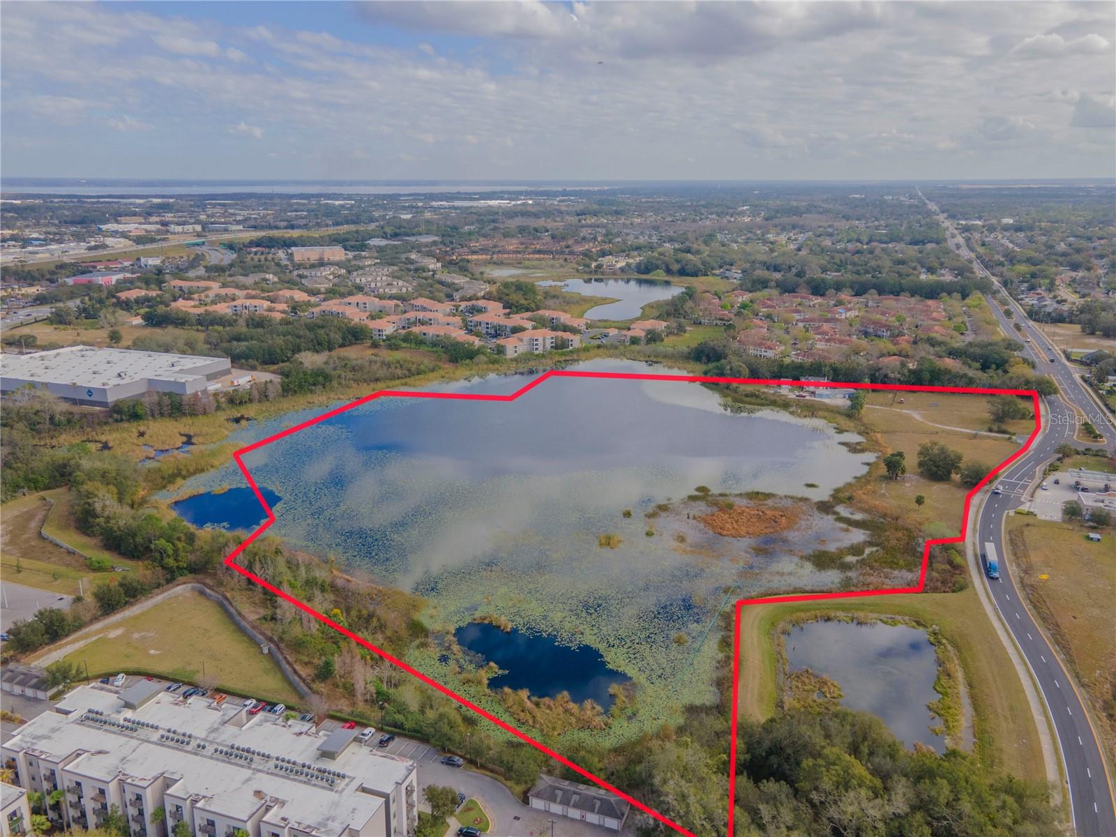 Private BASS LAKE !Own 19 Acre Lake Brian loaded with large mouth bass in the heart of Florida. 30 Minutes to Orlando. This property is located along the north side of County Rd 46A ,South and east of Rinehart Rd . The parcel contains 24.77+ acres, of which approximately 5.5 acres are uplands. . Property is zoned AG , and the future land use designation is Medium Density Residential by the City of Sanford .
