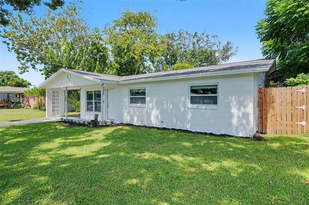 Photo of 506 Cambridge Circle, South Daytona, FL 32119 (MLS # O6441454)