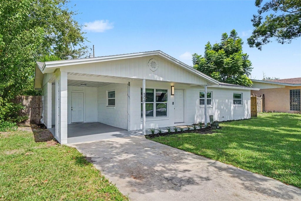 Photo of 506 Cambridge Circle, South Daytona, FL 32119 (MLS # O6441454)