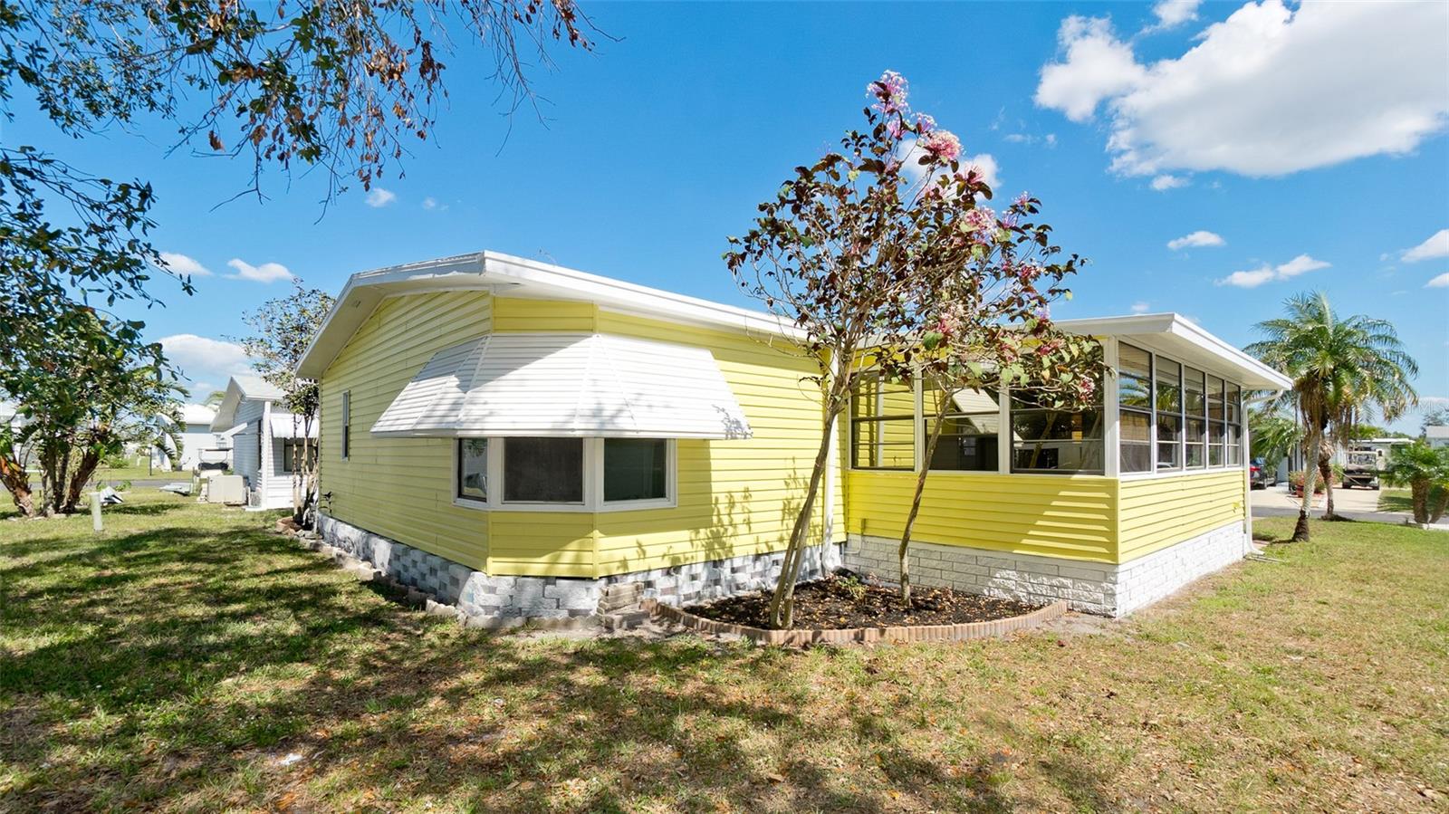 Beautifully Renovated Home in a Gated 55+ Community! Welcome to 5707 45th St E Unit #190, Bradenton, FL, a recently renovated and spacious home that includes a co-op share in the desirable Gold Tree community. This gated 55+ neighborhood offers a wealth of amenities and a vibrant, neighborly atmosphere. Enjoy hassle-free living with HOA fees covering cable, internet, water, sewer, trash, yard maintenance, and an irrigation system using reclaimed water from the community pond. Inside, you'll find sleek stainless steel kitchen appliances adding a modern touch to the beautifully updated kitchen. Gold Tree is packed with activities, featuring a clubhouse, heated pool, on-site management, library, shuffleboard, bocce ball, and tennis & pickleball courts. Residents receive a monthly newsletter with upcoming events, keeping you engaged and connected. Ideally located near shopping, dining, banks, hospitals, UTC Mall, Benderson Park, Riverwalk, and some of the top-rated beaches in the U.S., this home provides both convenience and relaxation. Plus, there’s a storage yard for boats, RVs, and trailers for added convenience. The community allows rentals, welcomes pets, and provides an exceptional lifestyle for its residents. Don't miss this opportunity—schedule your showing today!