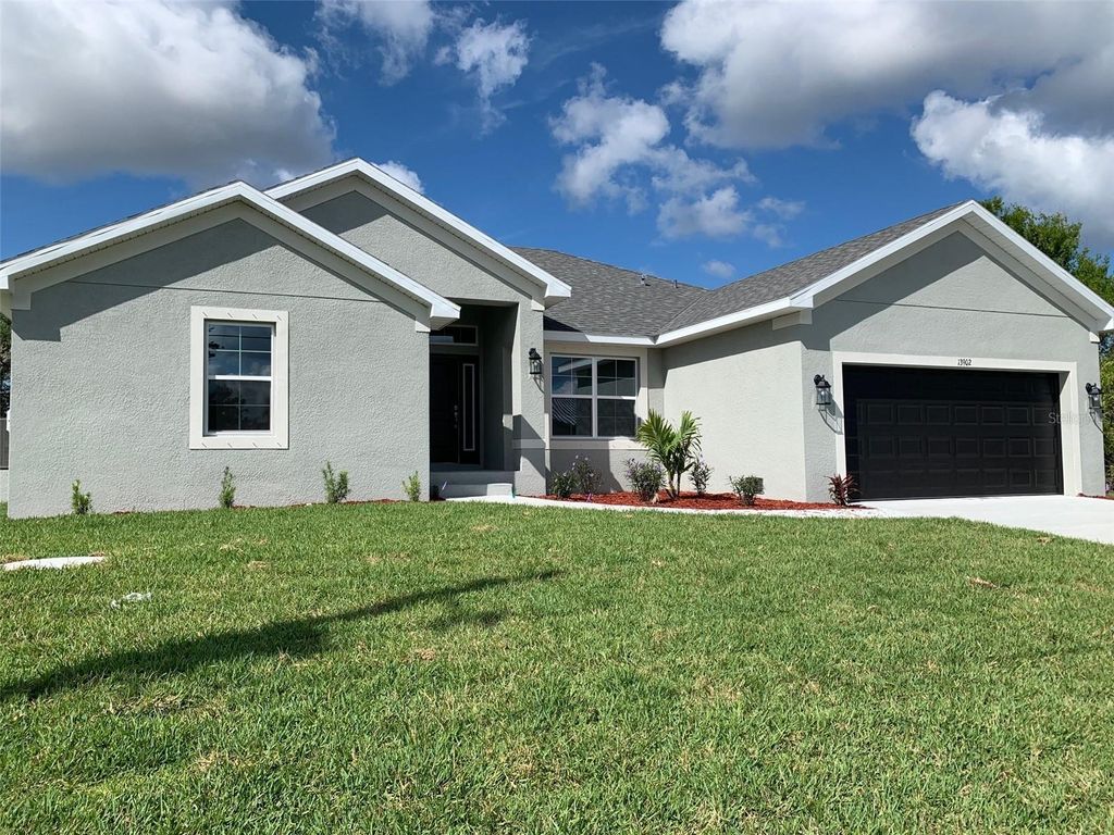 Photo of 13902 Allamanda Circle, Port Charlotte, FL 33981 (MLS # C7506043)