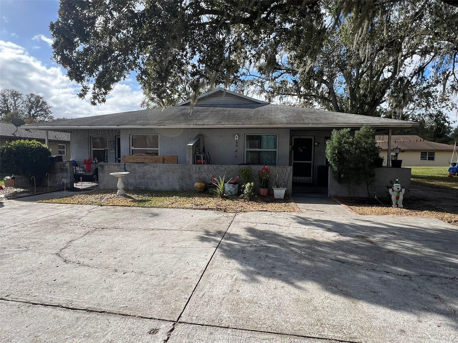 This 2-unit, 2-bedroom, 2-bath duplex is a great opportunity for investors or homeowners! Currently each unit is tenant-occupied on a month-to-month lease at $1,000/month for each unit, with tenants covering all utilities for both units. Recent updates include AC replacements in 2023 (Unit 5842) and 2024 (Unit 5840). Don’t miss out on this income-producing property! Please do not disturb tenants.