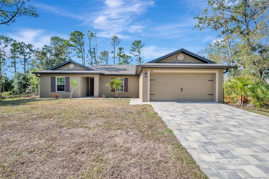 Enjoy peaceful Florida living in this move-in ready 3-bedroom, 2-bath newer construction home, built in 2022 and perfectly positioned on a large, serene lot in North Port — with no HOA, offering privacy and freedom while still close to all modern conveniences and just 30 minutes from stunning beaches. Located in an X flood zone, no flood insurance is required, and the newer construction allows for more affordable homeowners insurance, providing added peace of mind and long-term savings.

Step inside and discover a bright, open floor plan designed for everyday living and entertaining. The spacious living area flows seamlessly into the dining space and modern kitchen, featuring granite countertops, stainless steel appliances, and ample cabinetry.

The split floor plan offers privacy and comfort, with two guest bedrooms and a full bath on one side of the home, and a beautiful primary suite overlooking the backyard on the other. The primary retreat includes a large walk-in closet and en-suite bathroom, creating the perfect space to unwind.

Additional highlights include a freshly painted interior, paver driveway, sprinkler system, two-car garage, and hurricane shutters on all windows and sliders for added peace of mind.

Priced to sell and move-in ready, this home is ideal for full-time living, a seasonal retreat, or an investment opportunity — offering modern construction, privacy, and convenience all in one. Don’t miss your chance to enjoy easy, laid-back Florida living in this beautiful North Port home.