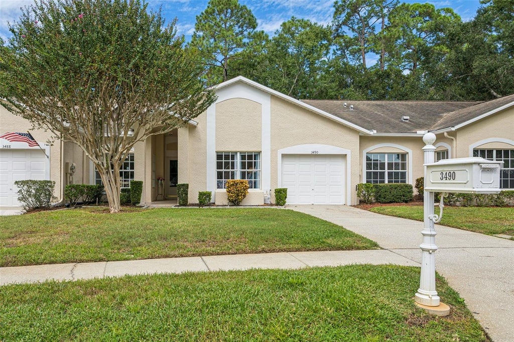 Photo of 3490 Tealwood Circle, Palm Harbor, FL 34685 (MLS # TB8554313)
