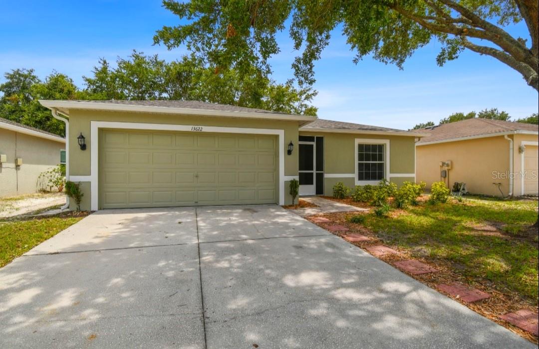 One or more photo(s) has been virtually staged. BACK ON THE MARKET after a fresh exterior paint job and a brand-new water heater! Welcome to this beautiful home located in the well-established Ashley Lakes Subdivision.
This move-in ready property boasts an open floor plan and has been thoughtfully updated throughout. Enjoy peace of mind with a brand-new roof (2025) and brand-new appliances, including a refrigerator, stove, dishwasher, microwave, washer, and dryer. The A/C unit is just a few years old, and plush new carpeting has been installed in all the bedrooms for added comfort.
Step outside to a spacious screened-in porch—perfect for relaxing Florida evenings without the hassle of bugs. The fully fenced and shaded backyard provides privacy, comfort, and plenty of space for entertaining guests, gardening, or letting pets play freely. Additional highlights include: Freshly painted interior. Generously sized master bedroom with a large walk-in closet
Open-concept living and dining areas ideal for everyday living and hosting
Attached two-car garage with ample storage
Quiet street with well-maintained neighboring homes
Located just minutes from shopping, restaurants, and the scenic Suncoast biking trail, with easy access to Tampa, the airport, and Florida’s world-famous beaches.
Low HOA fees—only $110 quarterly!
This home truly has it all—updates, location, and charm. Don’t miss your chance to tour it in person and make it yours!