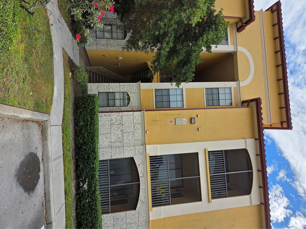 Photo of 6157 Metrowest Boulevard #304, Orlando, FL 32835 (MLS # S5139472)