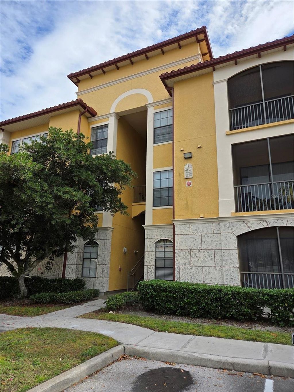 Photo of 6157 Metrowest Boulevard #304, Orlando, FL 32835 (MLS # S5139472)