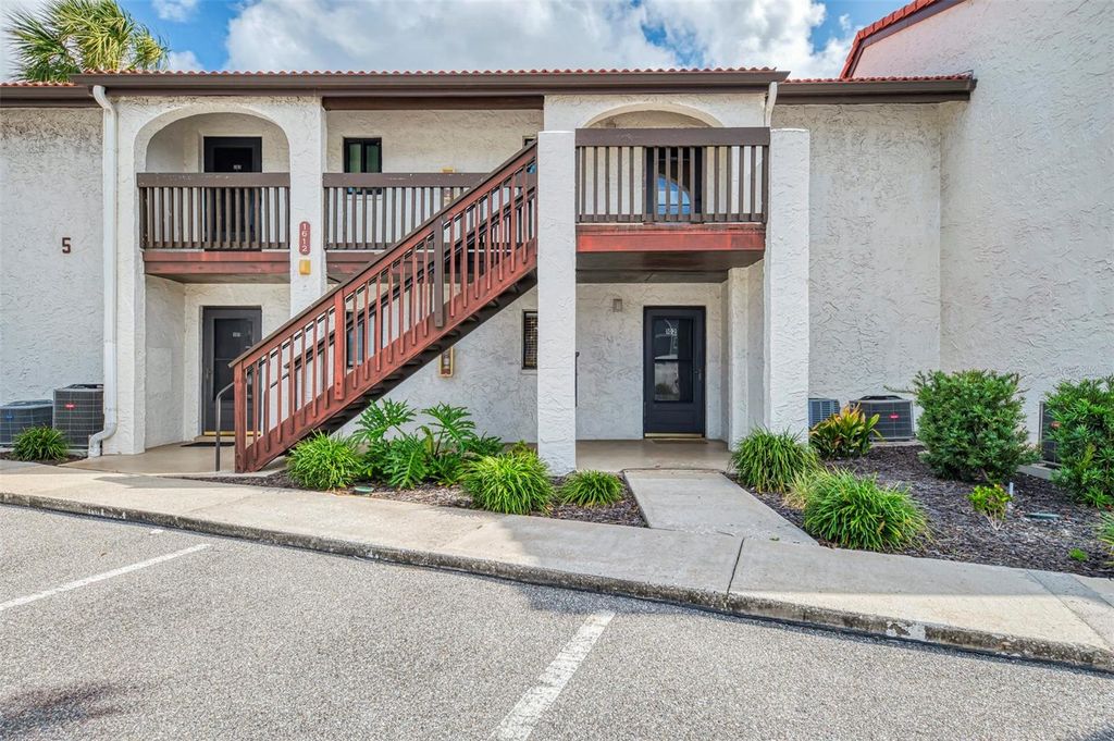 Photo of 1612 Stickney Point Road #1612-1, Sarasota, FL 34231 (MLS # A4688336)