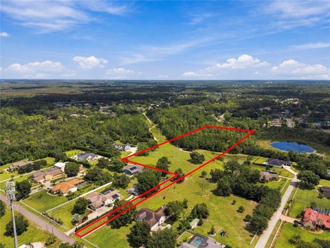 Photo of 7702 Rosa Maria Lane, Odessa, FL 33556 (MLS # W7889729)