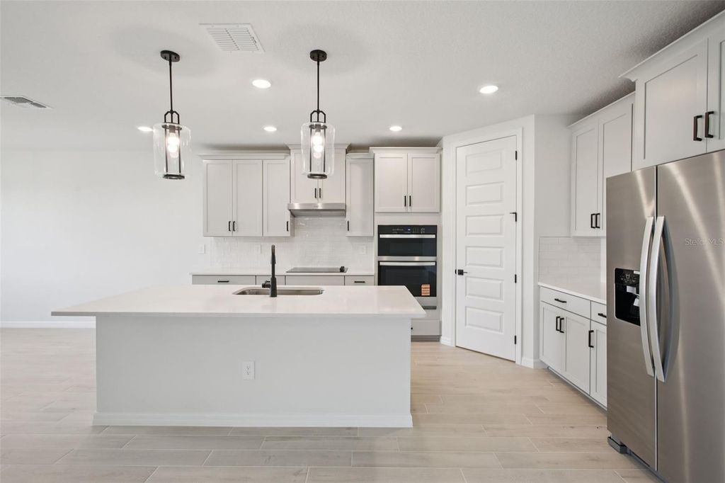Photo of 1806 Draughton Drive, Zephyrhills, FL 33541 (MLS # O6317141)