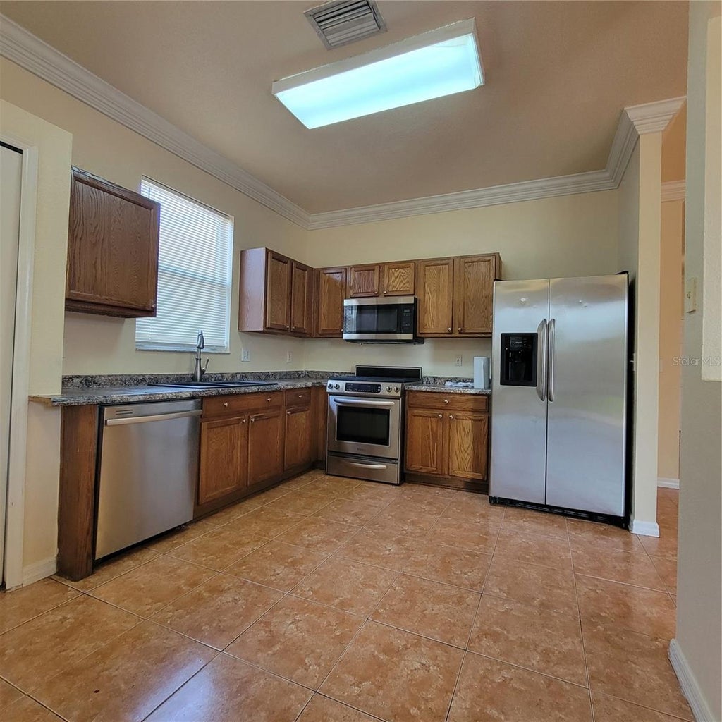 Photo of 10419 Goldenbrook Way, Tampa, FL 33647 (MLS # TB8546209)