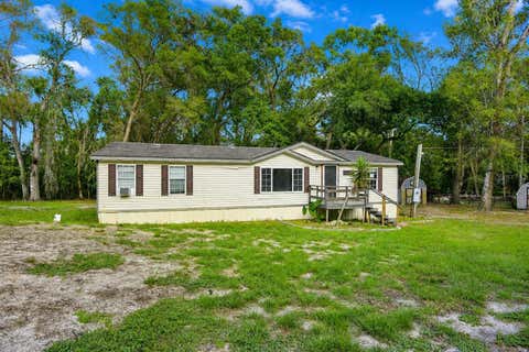 Photo of 17438 Lawless Road, Spring Hill, FL 34610 (MLS # W7888910)