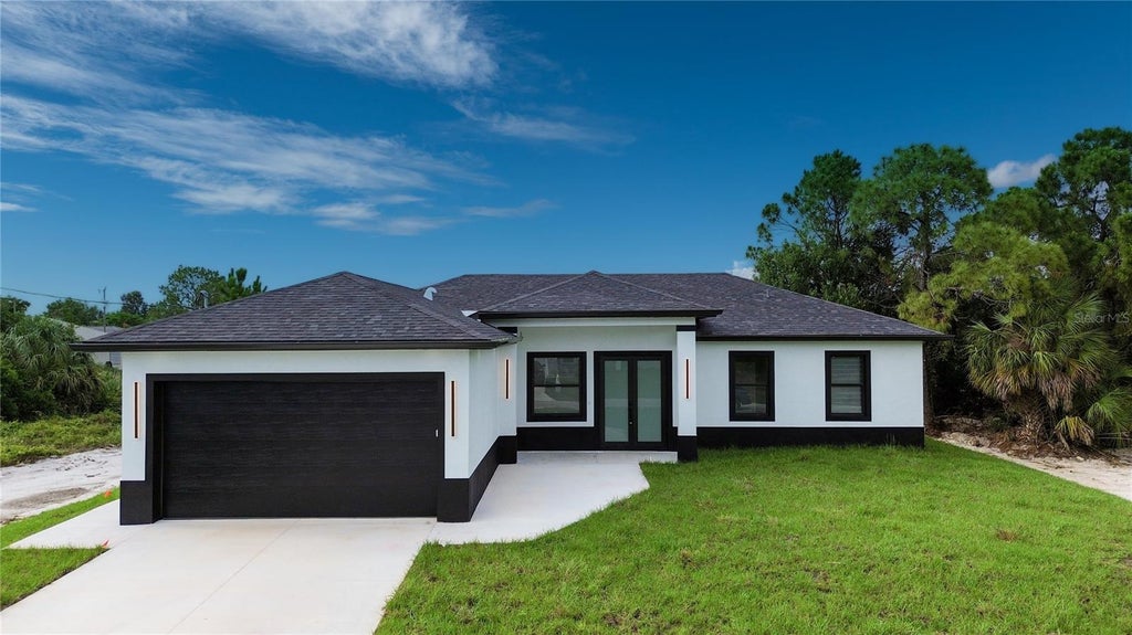 Photo of 3508 29th Street SW, Lehigh Acres, FL 33976 (MLS # C7527215)