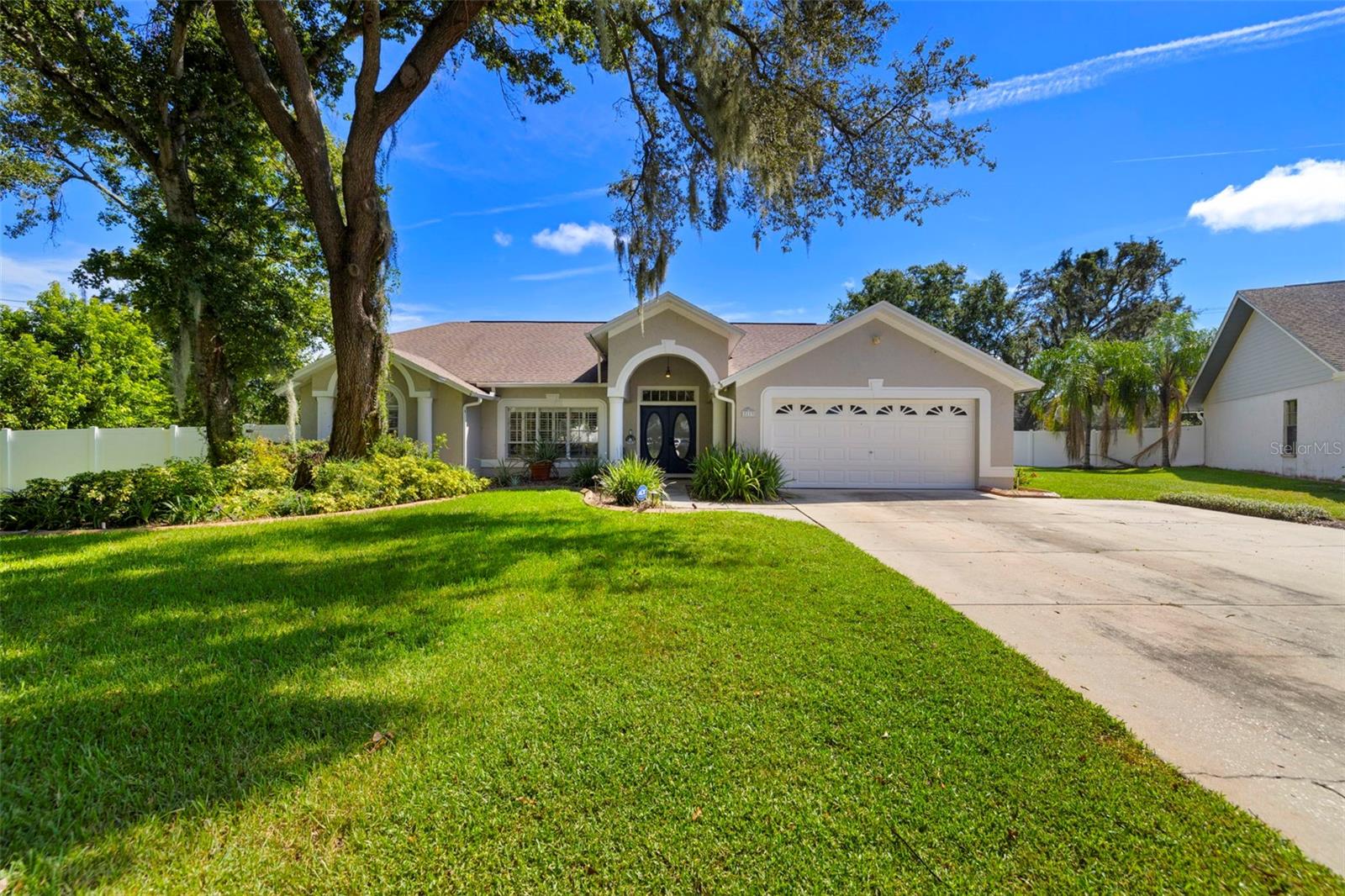 Welcome to your Florida dream home! This stunning updated residence in Valrico offers the perfect blend of style, space, and functionality - all just a short 20-minute drive to vibrant Downtown Tampa. Nestled on a spacious 0.34-acre fenced lot, this home is designed for both relaxation and entertainment. Step outside to enjoy a solar-heated pool within a screened-in enclosure, perfect for year-round enjoyment. The covered lanai features an outdoor fireplace, creating a cozy space to unwind or entertain guests. You'll also love the versatile private sports court, ideal for basketball or easily converted into a pickleball court. Inside, you'll find beautiful bamboo flooring and an electric fireplace that adds warmth and ambiance. The home features a formal living room and formal dining room, offering elegant spaces to host and gather. The updated kitchen and bathrooms showcase modern finishes and thoughtful upgrades throughout. The split floorplan ensures privacy, with the spacious primary suite separated from the additional bedrooms. Whether you're lounging by the pool, playing a game on the court, or commuting into the city, this home offers comfort, convenience, and plenty of room to live and play. Don’t miss your chance to own this one-of-a-kind property in one of Valrico’s most desirable locations. Schedule your private showing today!