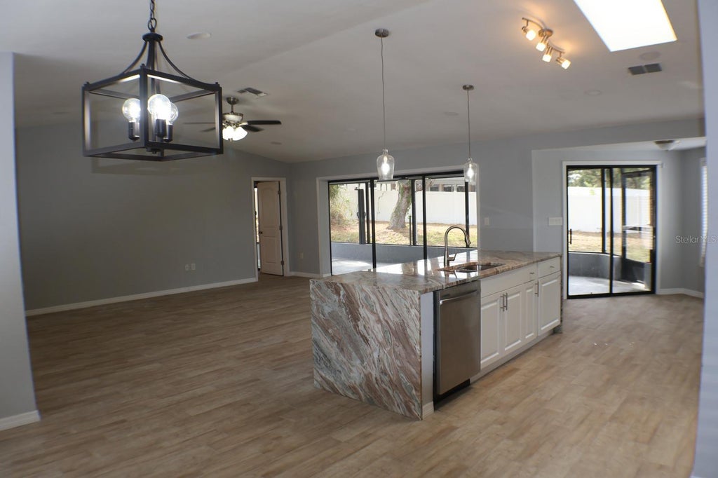 Photo of 13365 Drayton Drive, Spring Hill, FL 34609 (MLS # TB8559016)