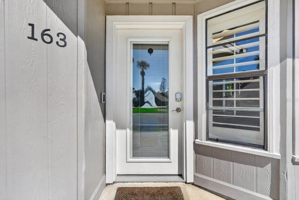 Photo of 163 Breezeway Court, New Smyrna Beach, FL 32169 (MLS # V4951019)