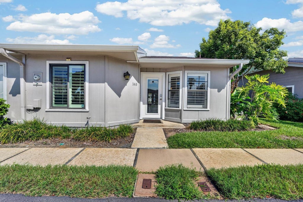 Photo of 163 Breezeway Court, New Smyrna Beach, FL 32169 (MLS # V4951019)