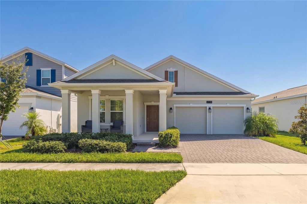 Photo of 1739 Good Neighbor Loop, Kissimmee, FL 34744 (MLS # O6430418)