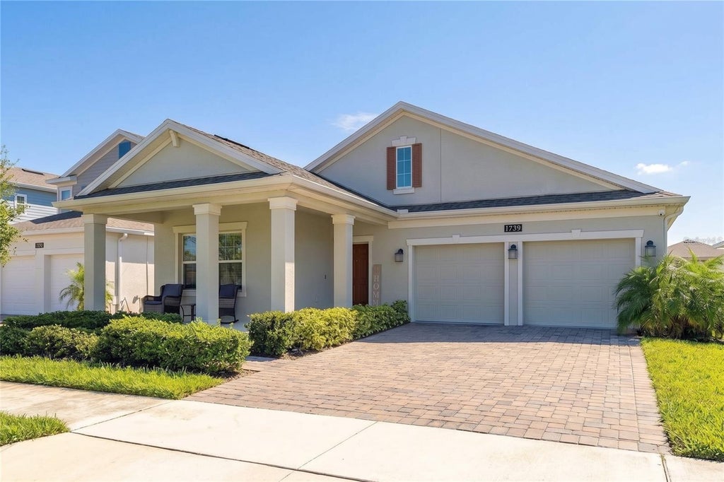 Photo of 1739 Good Neighbor Loop, Kissimmee, FL 34744 (MLS # O6430418)
