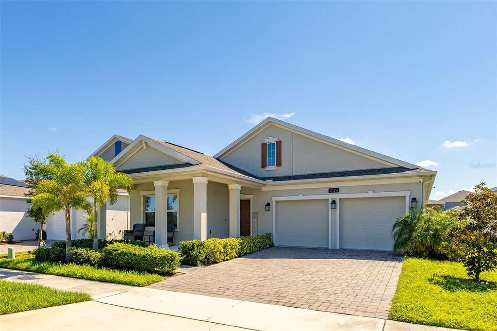 Photo of 1739 Good Neighbor Loop, Kissimmee, FL 34744 (MLS # O6430418)