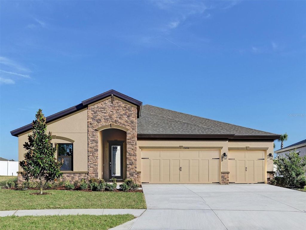 Photo of 13058 Long Valley Circle, Spring Hill, FL 34609 (MLS # TB8471409)