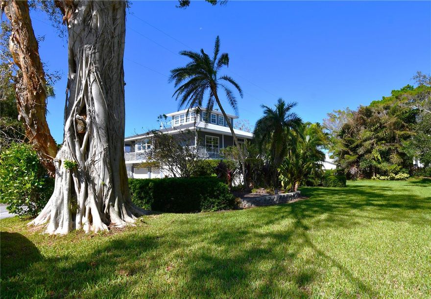 Escape to Your Perfect Tropical Retreat! 
Prepare to be captivated by this stunning waterfront home, designed to make your getaway unforgettable. Step inside and bask in an open, light-filled floor plan enhanced by double French doors and over 30 windows that invite in natural light and frame breathtaking water views. The modern, fully-equipped kitchen boasts granite countertops, stainless-steel appliances, a cozy breakfast nook, and an expansive eight-seater dining table—ideal for memorable family dinners with sunset views over the water. The oversized master suite is your personal oasis, featuring a luxurious king-sized bed, a spacious walk-in closet, and private access to the wrap-around screened porch overlooking the water. The spa-like master bathroom includes a soaking tub and walk-in shower, offering the ultimate relaxation experience. Two additional bedrooms are designed to suit all your needs. One offers a queen bed, while the other doubles as an office, complete with a queen Murphy bed for extra sleeping space. Venture upstairs to discover a spacious loft, set up as a movie room with a private balcony overlooking the bay—perfect for unwinding with more stunning views. Outside, a scenic boat dock awaits, complete with water and electricity access, ideal for kayaking or docking a small boat. And when you’re ready to explore, you’ll find Sarasota Airport just 5 minutes away, downtown Bradenton and Sarasota within 10 minutes, and pristine beaches only 20 minutes from your door. Book now and start your dream vacation in paradise!