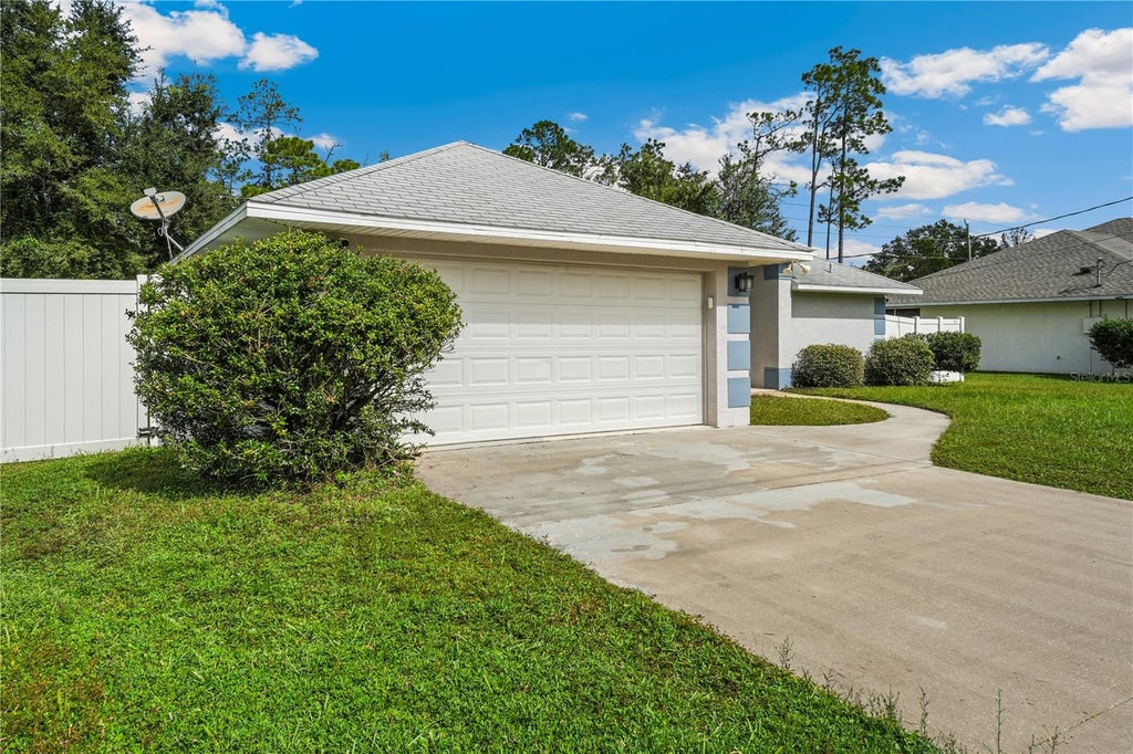 Photo of 20 Rymshaw Drive, Palm Coast, FL 32164 (MLS # FC322471)