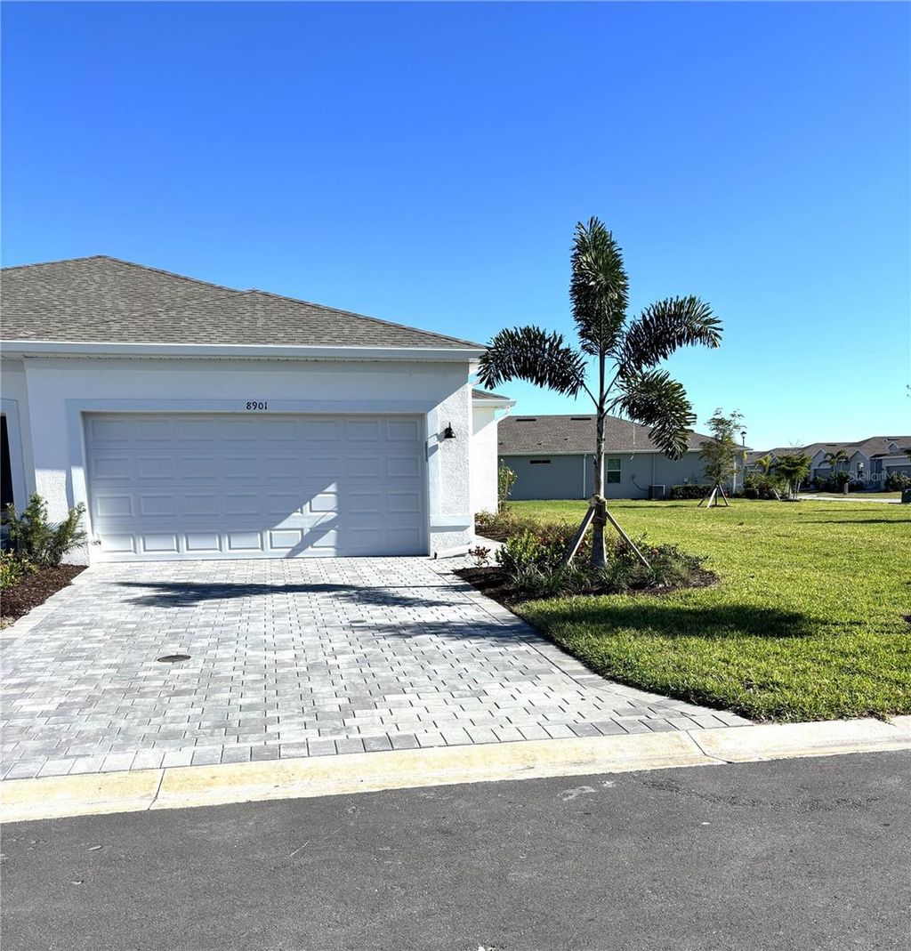 Photo of 8901 Saint Kitts Circle, Englewood, FL 34224 (MLS # A4670608)