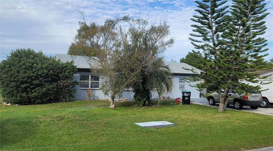 It doesn't get much more centrally located than this! Within 30 minutes of Disney, Universal, Downtown Orlando, and the airport. No HOA and located in Unincorporated Orange County. New roof, new carpet, new interior and exterior paint. This is a huge double-lot just under a half-acre, with a pool and garage/workshop. You'll have tons of space for activities!