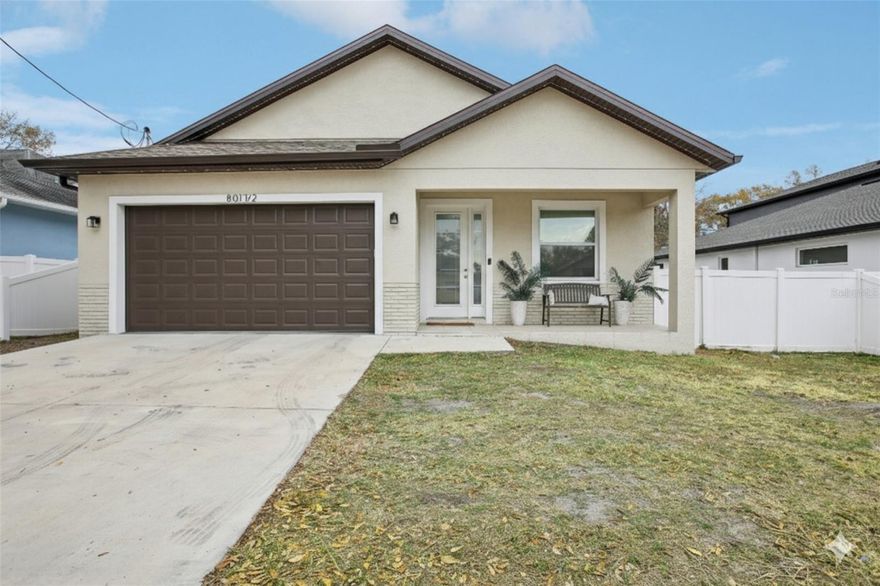 *New Build 2023* This terrific home feels like brand new construction and sits in a stellar spot just one block from the Hillsborough River. You’ll love the freedom of having no HOA or CDD to worry about! Inside, the space is bright and inviting with high ceilings, 5.5-inch baseboards, and stylish vinyl laminate flooring that runs throughout the entire house (tile flooring in the baths). The kitchen is bliss and features a large center island, 42-inch cabinets, a walk-in pantry, and a sleek glass tile backsplash paired with stainless steel appliances and stone countertops. The primary suite serves as a true getaway with its tray ceiling and a private bathroom that includes a double vanity and a gorgeous tile shower. If you need a dedicated spot to work, the separate office/4th bedroom is a huge plus. Step out back to find your private, fully fenced yard—now featuring a recently added paver patio that's perfect for hanging out. The location is unbeatable for getting around; you’re just minutes from the unique restaurants of Seminole Heights and a quick drive to the energy of downtown. Plus, you can leave the car behind and walk to the Zoo at Lowry Park or head over to the park and boat ramp for a day by the water. Best of all, this property is located in a preferred zone where flood insurance is not required!