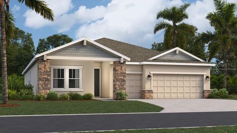 Photo of 717 Tundra Loop, Groveland, FL 34736 (MLS # O6372957)